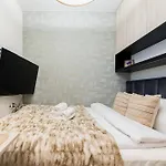 Apartment Grunwald Raszynska By Bookinghost