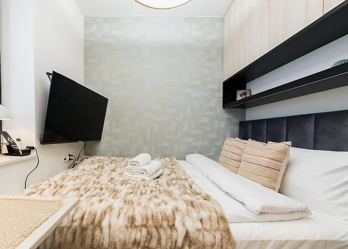 Apartment Grunwald Raszynska By Bookinghost